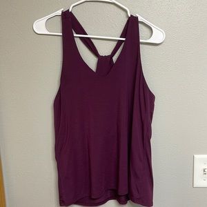 Athleta size medium. Never worn maroon tank top
